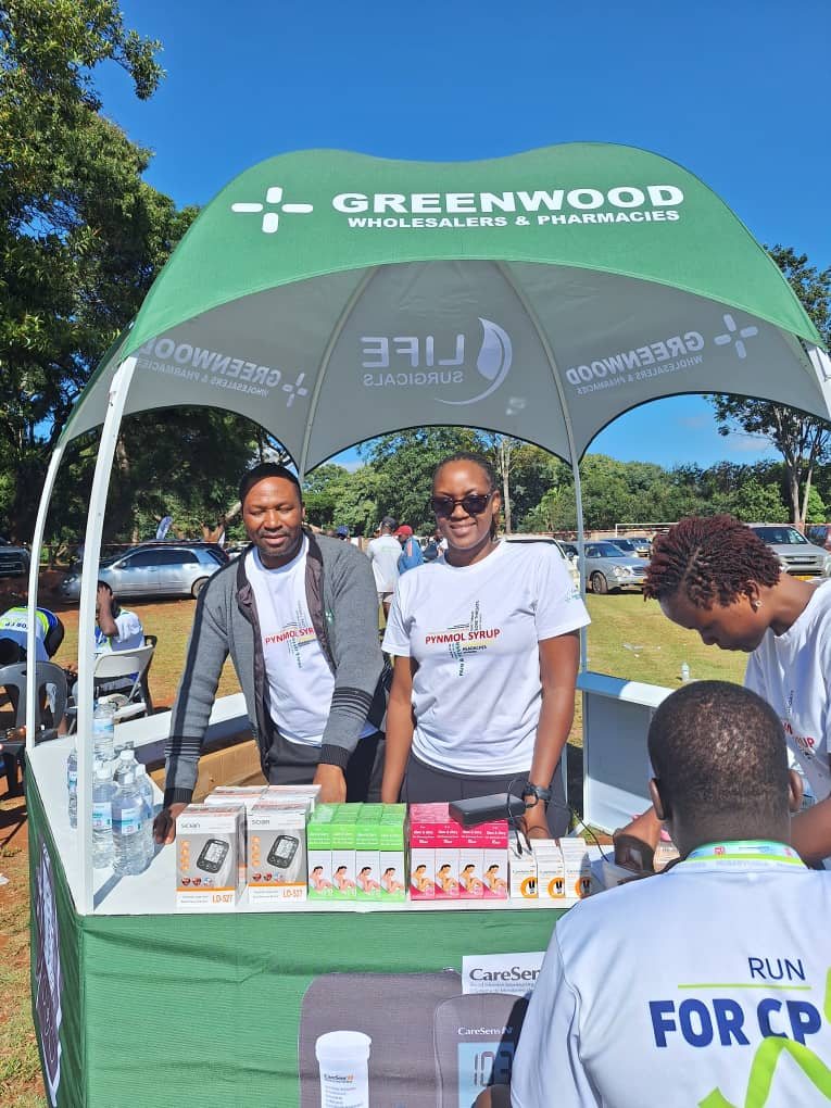 Greenwood Wholesalers and Pharmacies stand at a community fun run