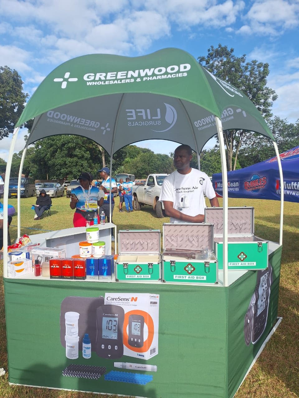 Greenwood Wholesalers and Pharmacies stand with health products on display